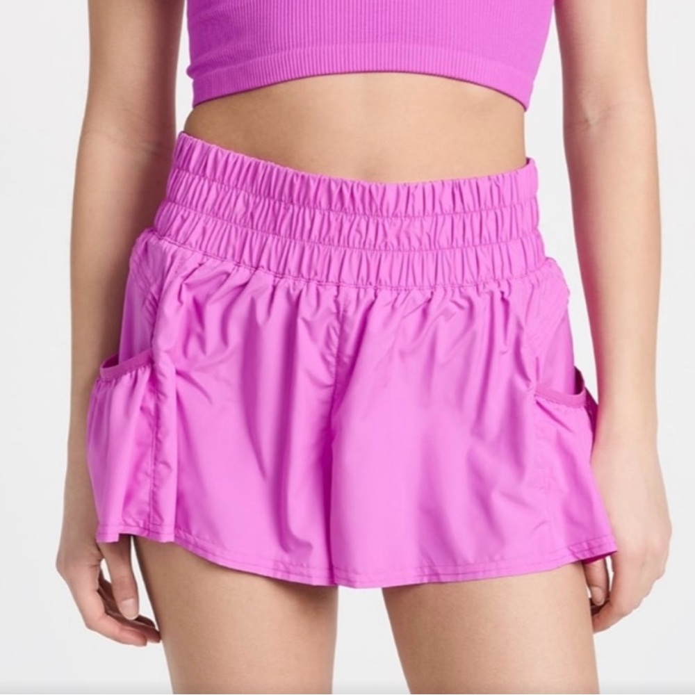 Free People Movement Get Your Flirt On Shorts In Neon Magenta Sold out color